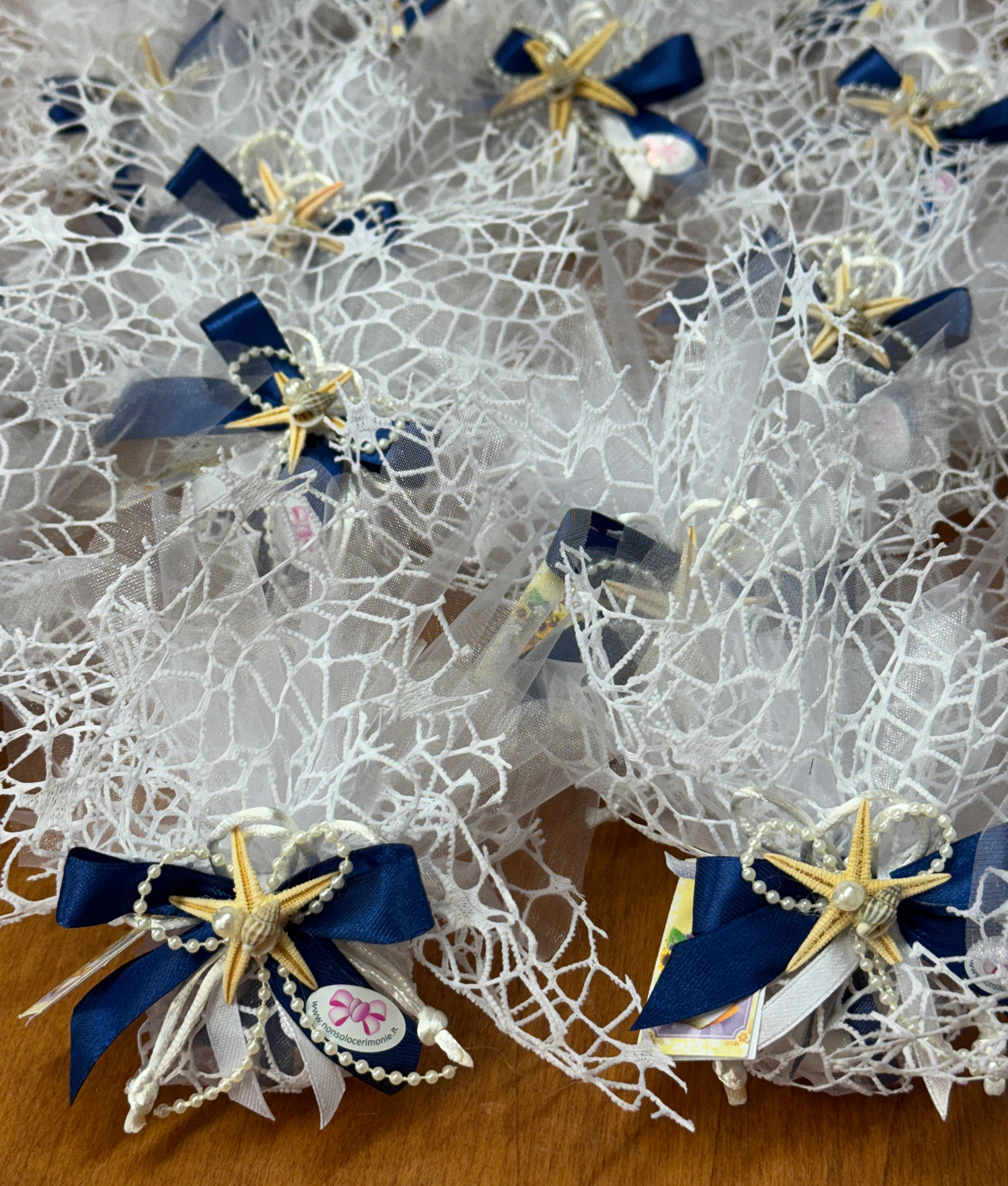Bomboniera Corallo Stella Bianco Blu 106 - NonSoloCerimonie.it